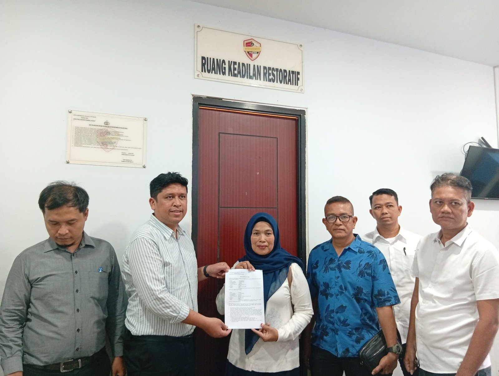  | Perseteruan E.T dengan salah satu Bank Terkemuka Tanah Air Berakhir Damai melalui Restorative Justice di Polda Riau